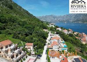 Na prodaju dvospratna kuca sa velikim placem i pogledom na more Muo Kotor