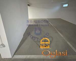 Garazno mesto u suterenu zgrade 11m2