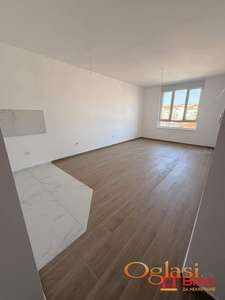 Telep – novogradnja 65m² sa terasom, liftom i zajedničkim dvorištem
