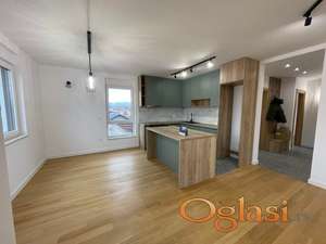 Polunamešten nov trosoban stan,parking-Telep 550e