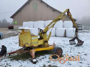 Grajfer bager utovarivac stajnjak