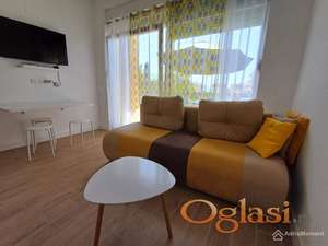 Novi stan u Bijeloj s terasom od 20 m2 i parkirnim mjestom