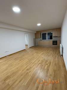 IZDAJE SE NOV STAN  - PRAZAN, 63m2, ZAJEDNO SA PARKING MESTOM