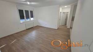 Dvosoban prazan stan za kancelarije sa parkingom