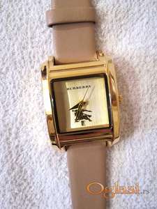 Odlican zenski rucni sat poznate marke Burberry Novo
