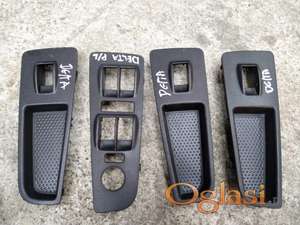 Lancia delta plastike prekidaca stakla