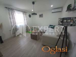 Prelep stan u prizemlju porodične zgrade, 80m2, kompletno renoviran, Donji Komren