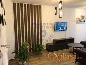 Kompletno namešten četvorosoban stan sa 2 garaže