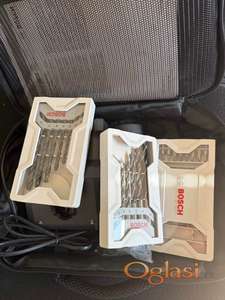 Bosch torba punjac 2 baterije 2 seta burgija i set nastavaka NOVO