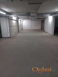 IZDAJE SE DUPLO PARKING MESTO U GARAZI ZGRADE, 40m2