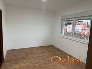 Jednoiposoban stan u novogradnji - Adice