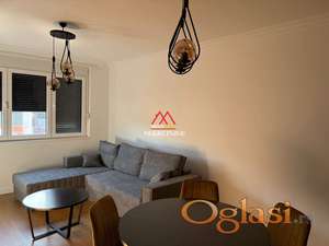 Telep - jednoiposoban - garažno mesto