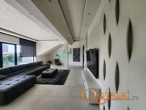 Prodaje se luksuzan četvorosoban stan sa četiri parking mesta 