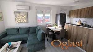 Nov jednoiposoban stan sa garažom