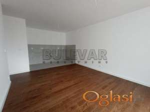 Izdaje se neuseljavan poslovni prostor u novom kompleksu Planet Residence, 76m2
