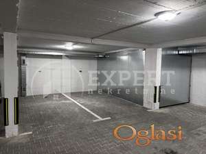 Izdaje se parking mesto u podzemnoj garaži, 11m2