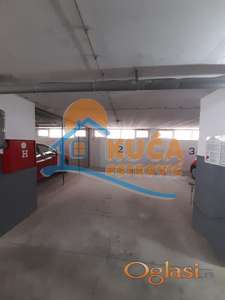 Izdaje se garažno mesto u podzemnoj garaži, 18m2