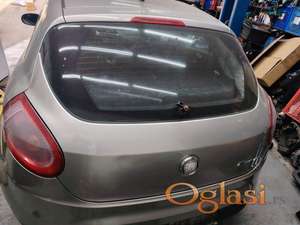Fiat bravo 2 zadnji gepek vrata - peta vrata kod boje 272 Originalni delovi  Moguca ugradnja delova  Alfa Romeo 147-156-166-159-GT-MiTo-Giulietta Fiat bravo 2 - croma -grande punto -multipla 2 -punto 3 -stilo-idea Freemont Panda 3 500L 500 500x Lancia ypsilon-delta-musa-lybra Volkswagen Golf 6  Audi a3 2012-2020 Volkswagen Passat B7  Ukoliko zelite da porucite Posaljite poruku preko sms poruke ili pozovite na telefon 0616115961