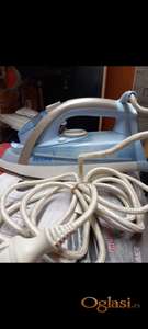 PRODAJEM PROFESIONALNU PEGLU NA PARU ,POTPUNO NOVA NE KORISCENA,MARKA FILIPS