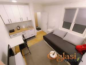 NAMEŠTENA GARSONJERA U CENTRU 