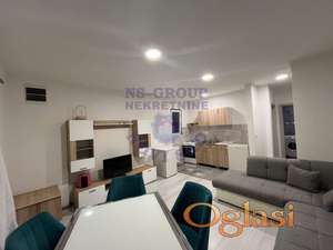 Vrlo komforan, četvorosoban stan, sa dve terase.