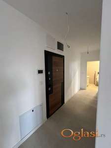 Prodajem nov stan u Rumi, ul.22.Decembar