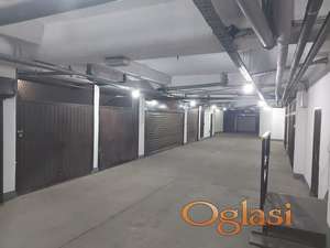 Garaža u suterenu stambene zgrade, površine 12 m²