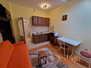 Garsonjera u centru, Miletićeva ulica