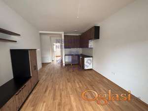 Na prodaju dvosoban stan površine 42m², smešten u kvalitetnoj novogradnji na odličnoj lokaciji u Petrovaradinu.