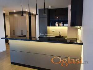 Izdavanje stanova K-District-Cetvorosoban polunamesten stan,garaza