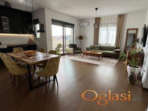 Moderan stan od 97 m², sa  terasom od 100 m², ostavom od 6 m² i garažom od 19m2.